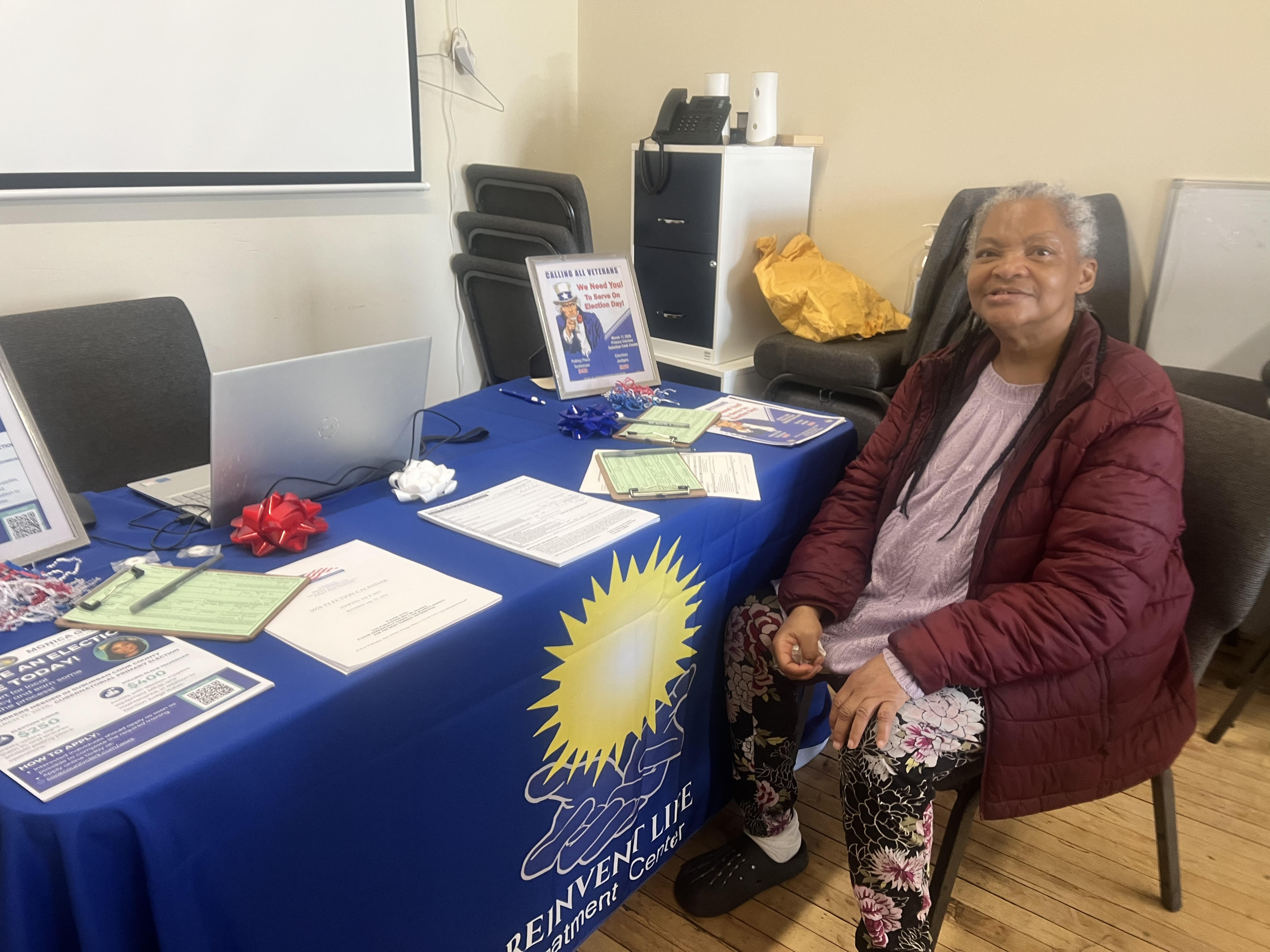 Community member at voter registration table